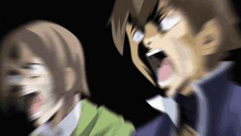 a blurry picture of a man and a woman screaming in the dark .