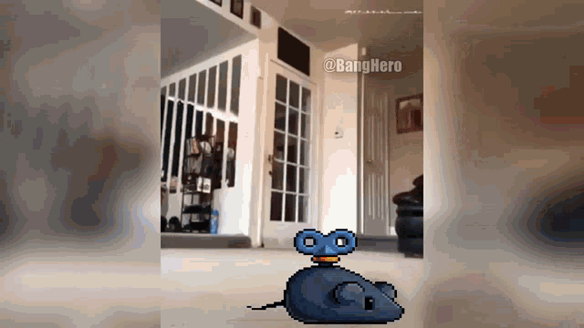 a pixel art of a mouse with a blue head and a yellow collar