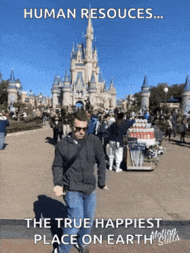 a man is standing in front of a disney castle with a caption that says human resources ... the true happiest place on earth