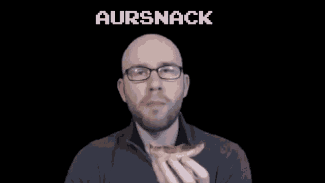 a bald man with glasses is holding a piece of pizza in front of a black background with the words aursnack on it