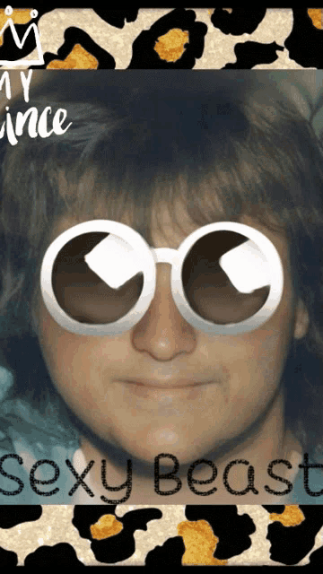 a picture of a man wearing sunglasses with the words sexy beast on the bottom