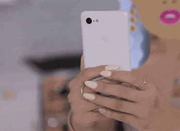 a cartoon of a woman taking a selfie with her cell phone