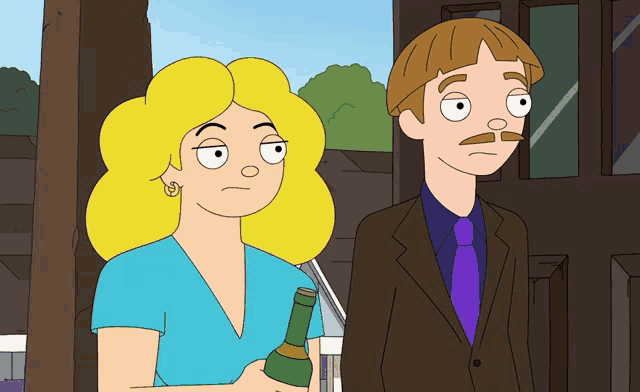 a man and a woman are standing next to each other and the woman is holding a bottle of wine