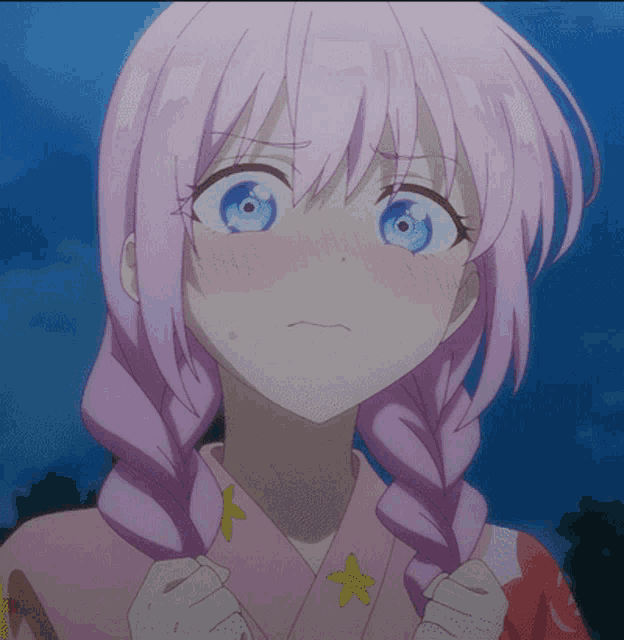 a girl with pink hair and blue eyes has a yellow star on her shirt