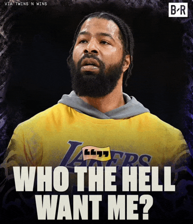 a man with a beard wears a lakers shirt
