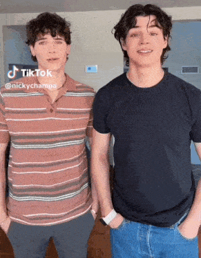 two young men are standing next to each other with their hands in their pockets and a tiktok written on the bottom