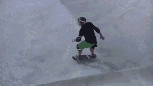a person riding a skateboard down a ramp with a mountain dew advertisement behind them
