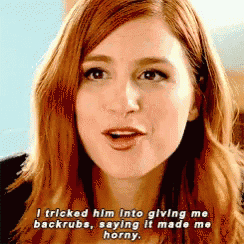 a close up of a woman 's face with the words i tricked him into giving me backrubs saying it made me horny