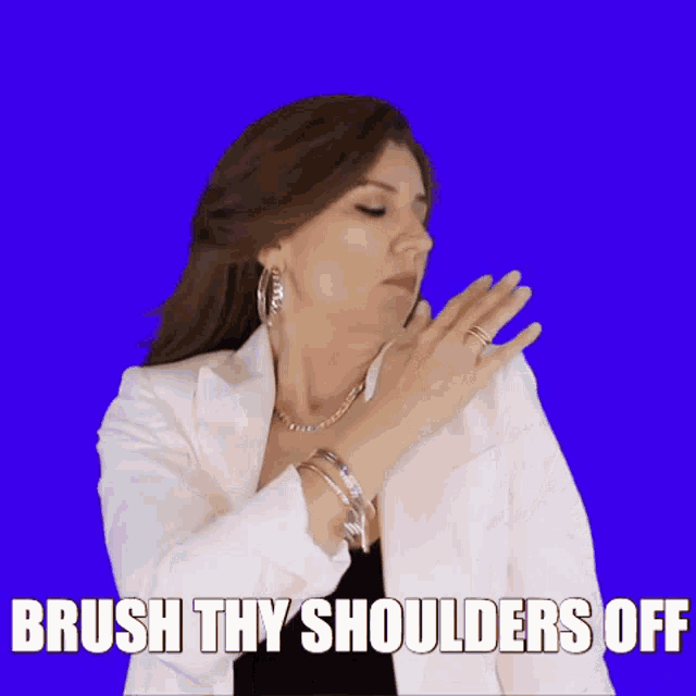 a woman in a white jacket and black top says " brush thy shoulders off "