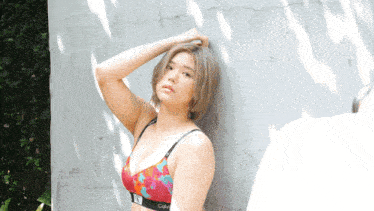 a woman wearing a bra that says calvin klein on it