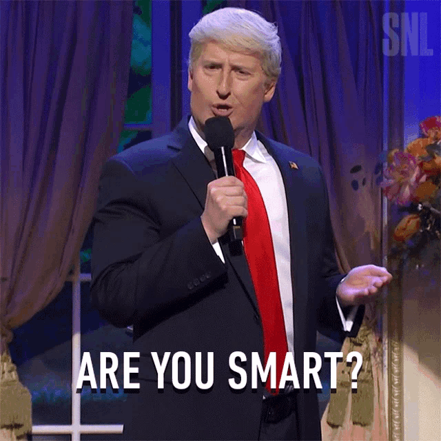 a man in a suit and tie is holding a microphone with the words are you smart below him