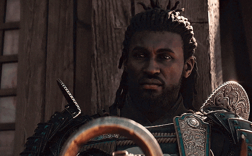 a man with dreadlocks is looking at something in a video game
