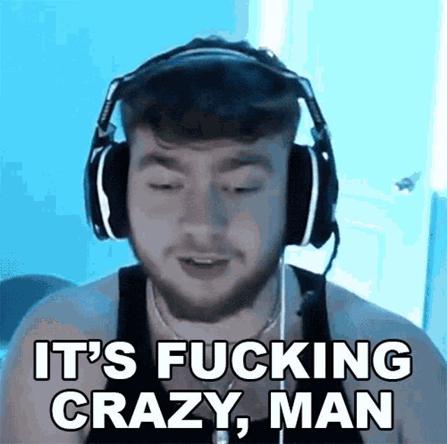 a man wearing headphones says " it 's fucking crazy , man "