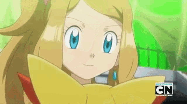 a close up of a cartoon character 's face with a cn logo in the background .