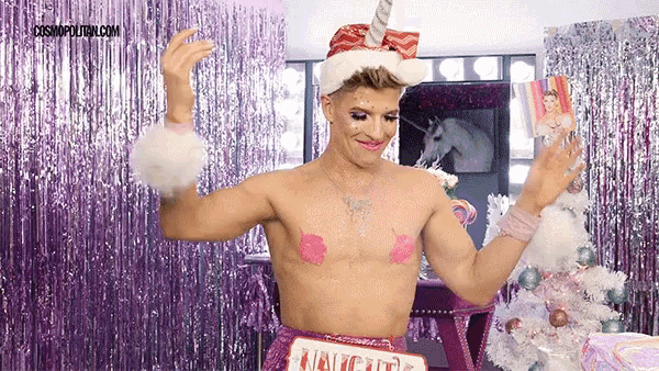 a man dressed as a unicorn with a sign that says unicorn