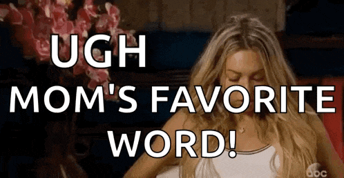 a woman is sitting in front of a vase of flowers and saying ugh mom 's favorite word .