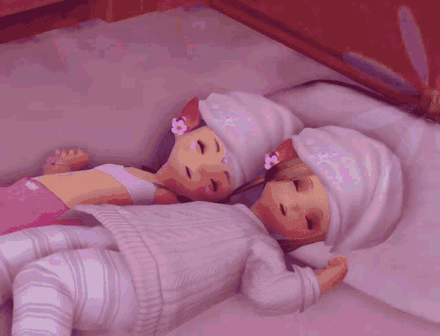 two dolls laying on a bed with one wearing a white sweater