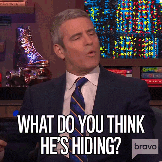 What Do You Think Hes Hiding Andy Cohen GIF - What Do You Think Hes Hiding Andy Cohen Watch What Happens Live GIFs