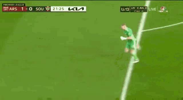 a soccer player is running on a field during a game .