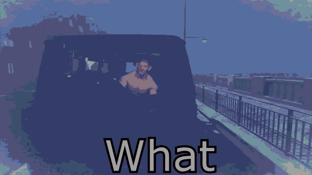 a shirtless man is sitting in the back of a car with the words " what " below him