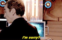 a man says i 'm sorry in front of a computer monitor