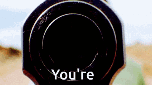 a close up of a black object with the words you 're on it