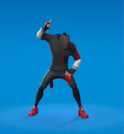 a man in a black and red hoodie is standing on his knees on a blue background .