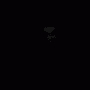 a close up of a man 's face with a black background