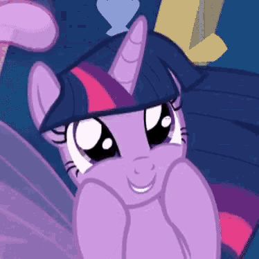 twilight sparkle from my little pony is smiling and looking down