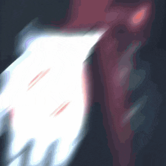 a blurred image of a person 's hand with a light coming out of it