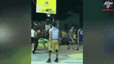 a basketball player wearing a number 10 jersey