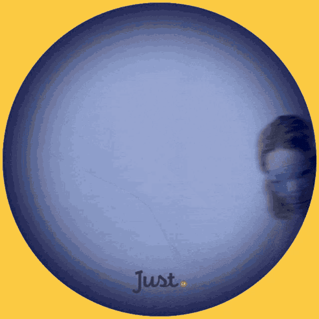 a blue circle with the word just in white letters