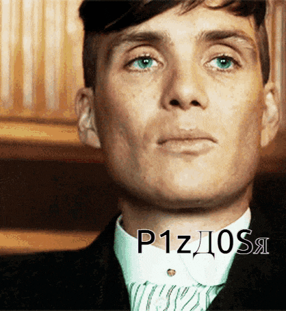 a close up of a man 's face with the letters p1z10s written below him