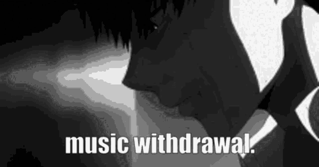 a black and white image of a man with headphones and the words `` music withdrawal '' .