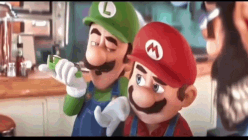 two cartoon characters , mario and luigi , are standing next to each other on a kitchen counter .