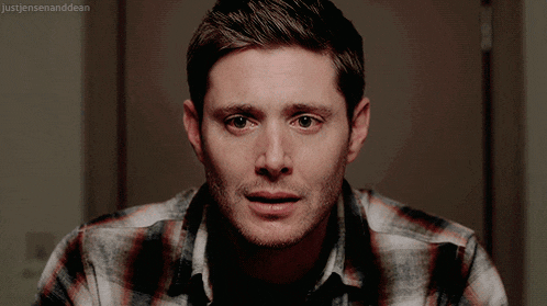 a close up of a man 's face with the words just jensen and dean written below him