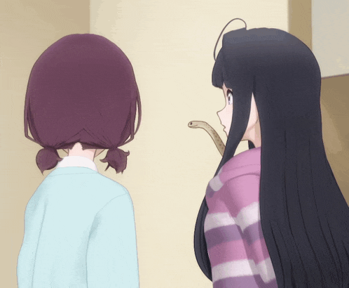 two anime girls are standing next to each other and one has a snake in her hand