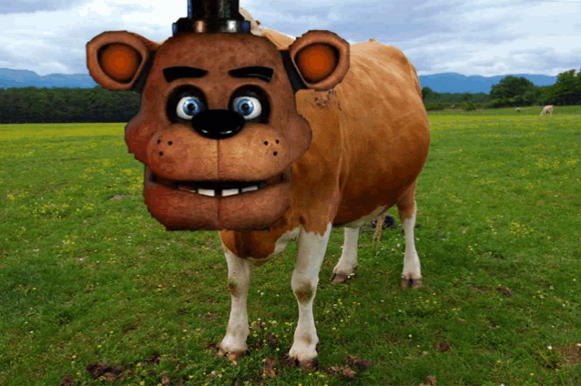 a cow that looks like freddy fazbear standing in a field