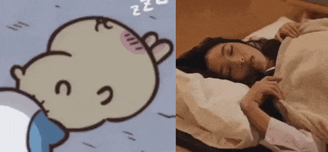 a woman is sleeping in a bed next to a cartoon of a bear sleeping .