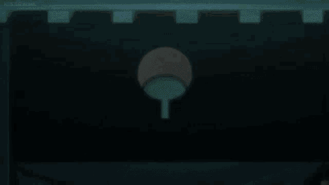 a building with a tiled roof is surrounded by trees at night with a full moon in the sky .