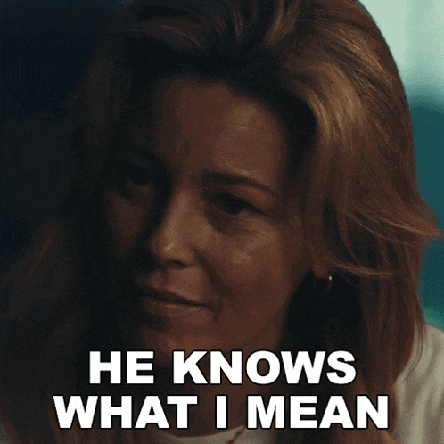 a close up of a woman 's face with the words he knows what i mean