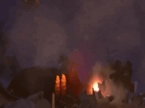 a rocket is flying through the air with smoke coming out of it 's tail