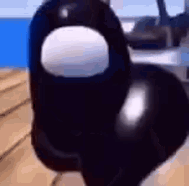 a close up of a black object with a circle in the middle .