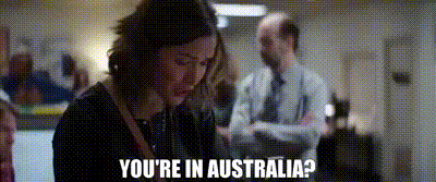 a woman is talking on a cell phone and says `` you 're in australia '' .