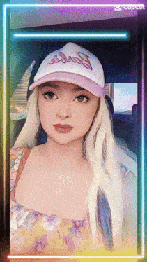 a woman wearing a pink and white barbie hat looks at the camera