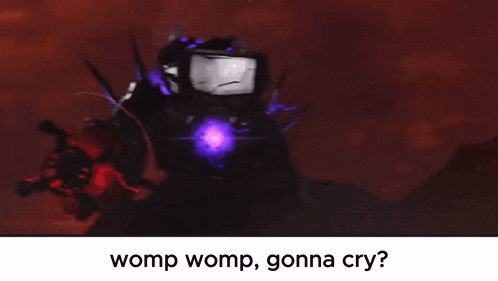 a picture of a robot with the words `` womp womp , gonna cry '' written below it .