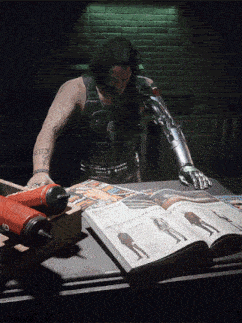 a man with a prosthetic arm is looking at a book that says ' the style guide for men '