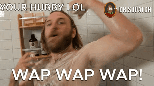 a man taking a shower with the words " your hubby lol wap wap wap "