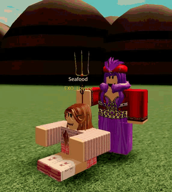 a girl in a purple dress is standing next to a girl in a pink shirt with the name exo loveee on the bottom right