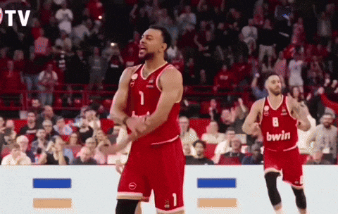 a basketball player with the number 1 on his jersey stands on the court